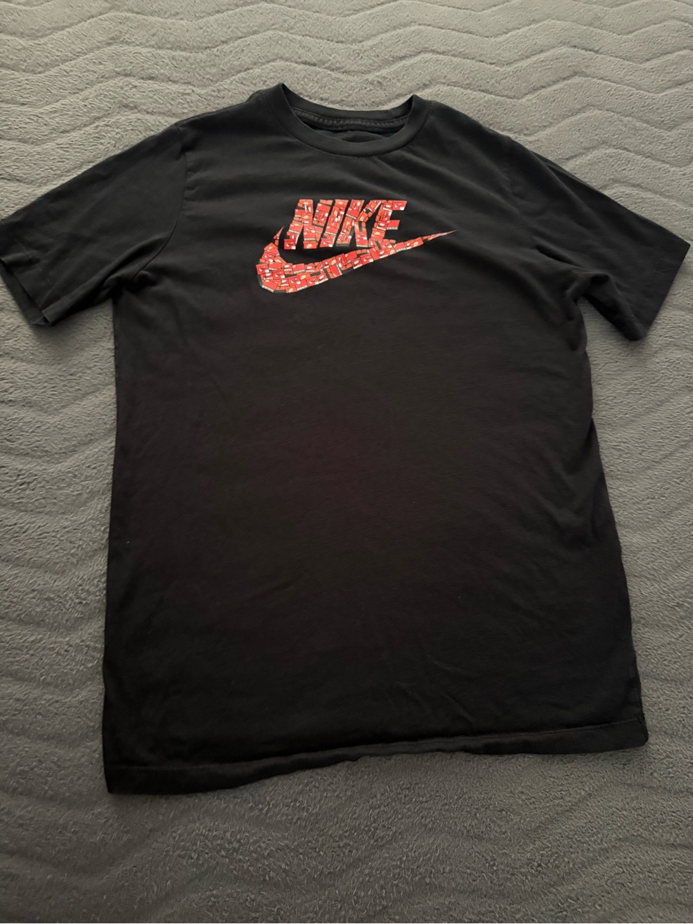 Nike Kids Black Tee with Red Mosaic Logo